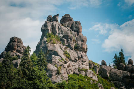 Remains of the rocks of the city of Tustan fortress in the Carpathian mountainsの写真素材