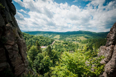 summer mountain landscape, forest, cloudsの写真素材