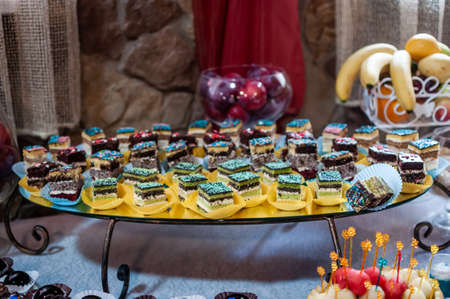 Sweet cakes at a wedding buffet. Cateringの写真素材