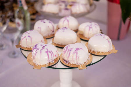 Candy bar with sweet cakes at a wedding