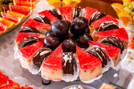 Sweet cakes at a wedding buffet. Cateringの写真素材