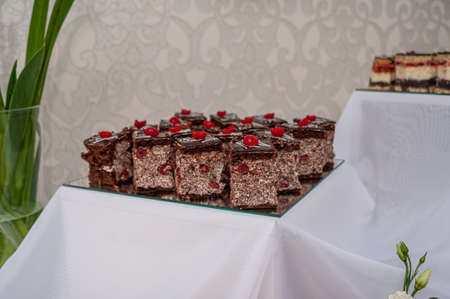 Sweet cakes at a wedding buffet. Cateringの写真素材