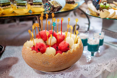 Fruit slicing at the wedding buffet