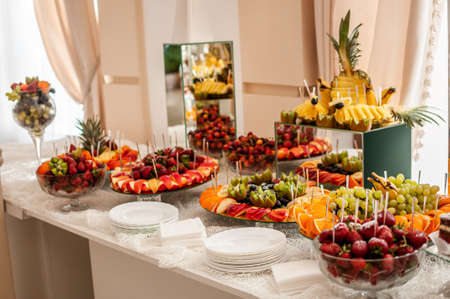 Fruit slicing at the wedding buffet