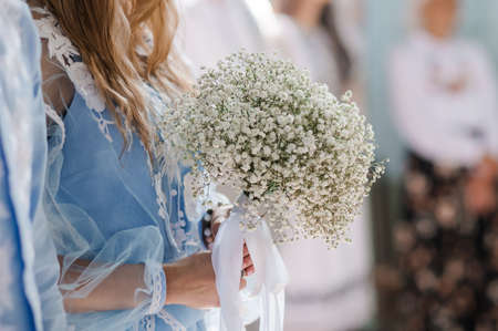 Bouquet of flowers in the hand of the brideの写真素材