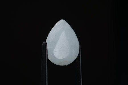 Natural stone aquamarine on a black background