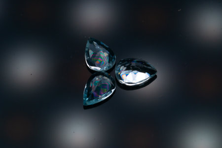 Natural stone blue topaz on a black backgroundの写真素材