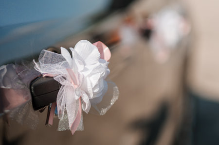Car decoration for a wedding. Decorations on the car of the newlyweds. Cortege at the weddingの写真素材