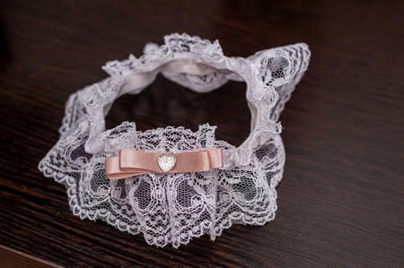 Bride garter on brown backgroundの写真素材