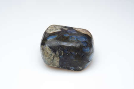 Natural gemstone liberite on white background