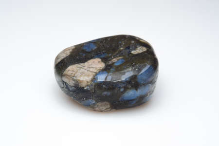 Natural gemstone liberite on white background