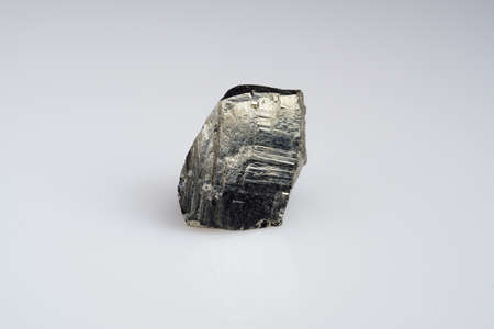Natural gemstone pyrite on white background