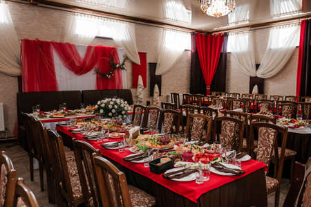 Served table. Plates with food on the table