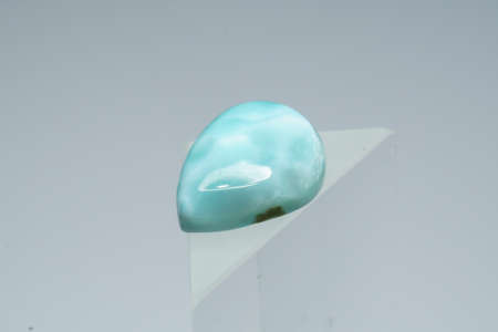 Natural larimar stone on white backgroundの写真素材