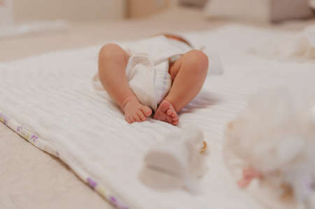 closeup legs of the child on bedの写真素材