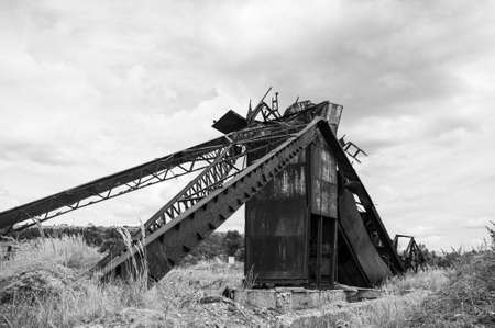 factory. vertical shaft of an abandoned salt mine in ukraineの写真素材