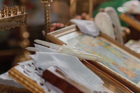 Wedding decoration in the church, candles, blurred backgroundの写真素材