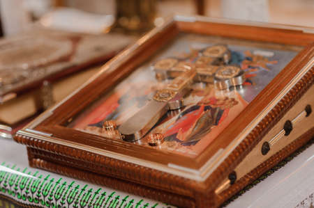 Wedding decoration in the church, crowns, wedding rings