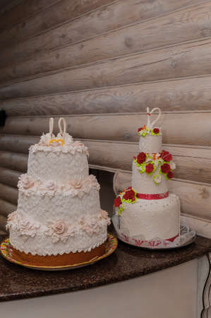 Beautiful wedding cake decorated with flowers, cake close upの写真素材