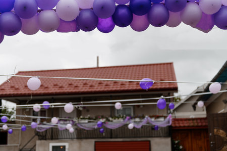 Wedding arch made of colorful balloons. Children's holiday celebration. purple balloonsの写真素材