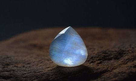 Natural precious moonstone on a brown background. Natural stone adulariaの写真素材