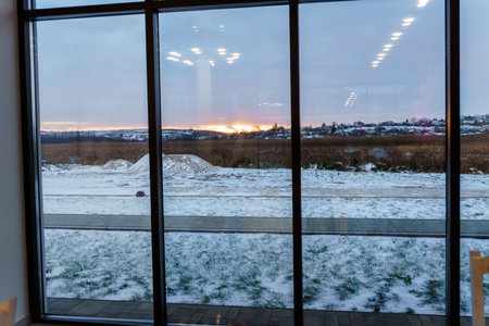 Sunset outside the window. Landscape outside the window