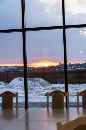 Sunset outside the window. Landscape outside the window