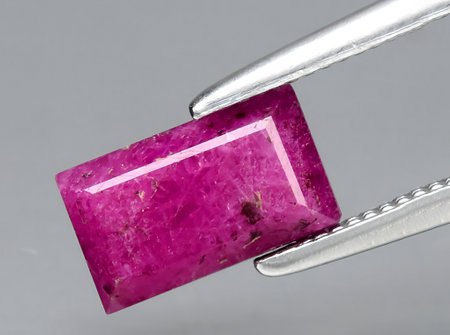 natural pink red ruby gem on backgroundの写真素材