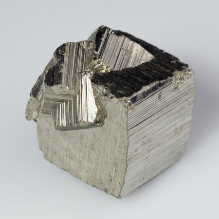 natural silver pyrite gem on white background