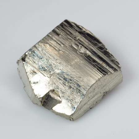 natural silver pyrite gem on white background