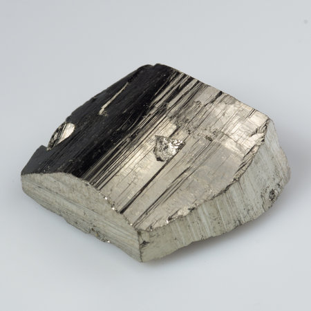 natural silver pyrite gem on white background