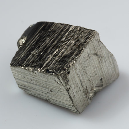 natural silver pyrite gem on white background