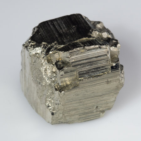 natural silver pyrite gem on white background