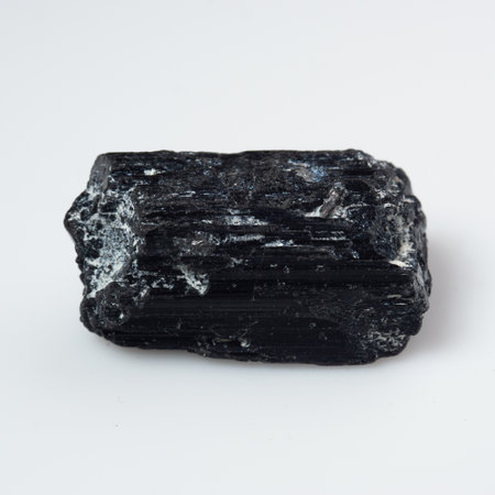 natural black tourmaline scherl on white background