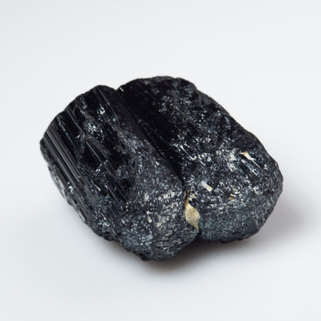 natural black tourmaline scherl on white background