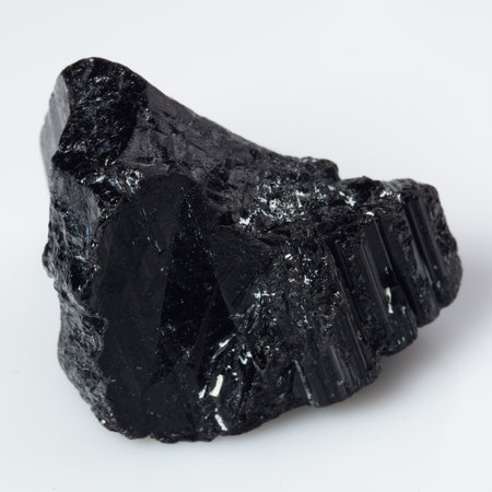natural black tourmaline scherl on white background