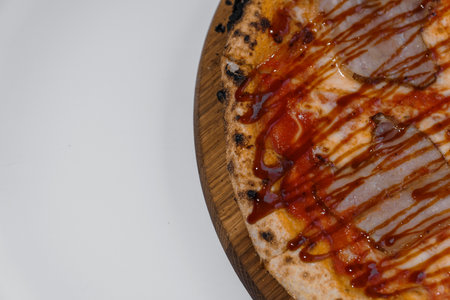 Pizza with salami and prosciutto. Meat pizza with cheese and capersの写真素材