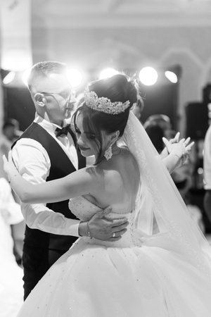 Timeless Elegance: A Black and White Moment of First Dance Romance at a Wedding Reception.の写真素材