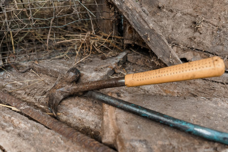 Rustic Tool Arrangement in a Weathered Barn Setting.