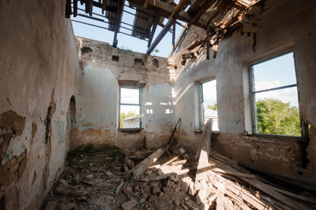 A Sunlit Abandoned Interior of a Weathered Ruin Embraced by Nature.