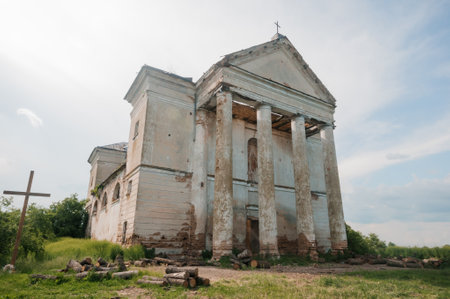 Abandoned Elegance: The Timeworn Church Amidst Nature's Embrace.の写真素材