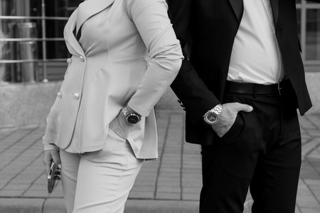 Elegant Couple in Contrast: A Stylish Evening Attire Showcase.の写真素材