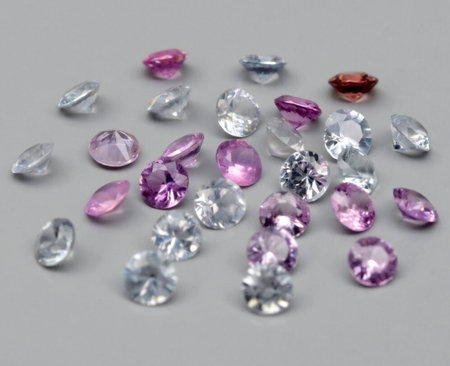 A Dazzling Collection of Natural Gemstones with Vivid Colors and Varied Cuts Displayed Artfully.の写真素材