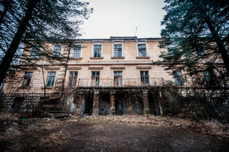 Abandoned Elegance: The Forgotten Facade of a Once Majestic Villa.の写真素材