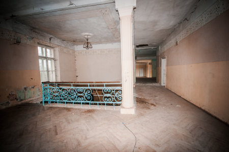 Abandoned Elegance: A Decaying Interior of a Forgotten Space.の写真素材