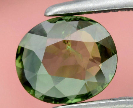 Exquisite Green Tourmaline Gemstone Captured in Elegant Illumination.