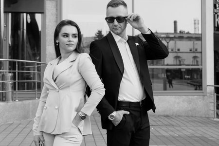 Elegant Urban Professionals Exuding Confidence in Monochrome Fashion.の写真素材