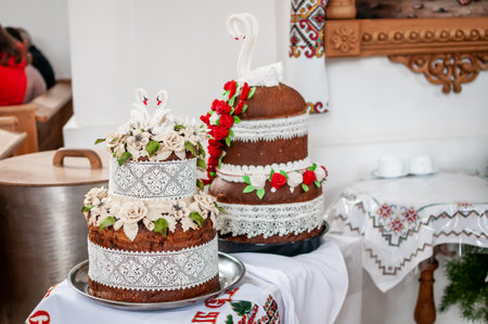 Exquisite Traditional Wedding Celebration Cake Display with Floral and Decorative Accents.の写真素材