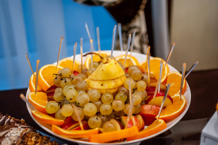 Exquisite Fruit Platter Displayed Elegantly on a Festive Table.の写真素材