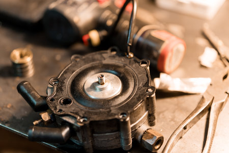Close-Up of an Automotive Fuel Pump Component on a Workbench.の写真素材
